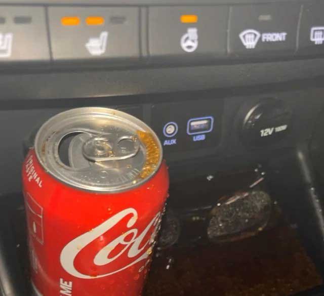 spill drink on car console